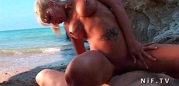  Spanish busty blonde babe sodomized by a french guy on a public beach